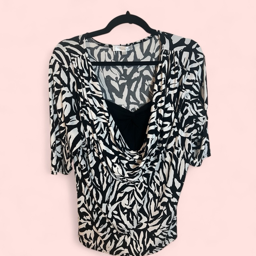 An August Silk top in size extra large
